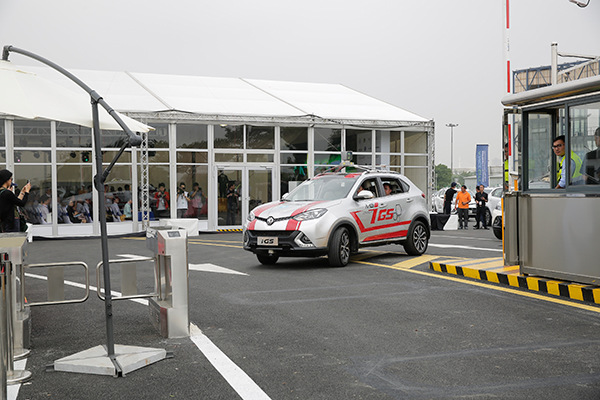 Visitors test intelligent connected vehicles at the National Intelligent Connected Vehicle Testing Demonstration Base in Shanghai on June 7. (Photo provided to China Daily) Visitors test intelligent connected vehicles at the National Intelligent Connected Vehicle Testing Demonstration Base in Shanghai on June 7. (Photo provided to China Daily)