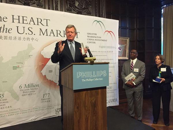 Max Baucus, U.S. Ambassador to China, makes a keynote speech as Jim Coleman, President and CEO of Prince George's County Economic Development Corporation; and Libby Garvey, chair of the Arlington County Board, look on at a GWCIC reception for the Chinese business delegation in Washington on Sunday. (Photo by Cai Chunying /China Daily) Max Baucus, U.S. Ambassador to China, makes a keynote speech as Jim Coleman, President and CEO of Prince George's County Economic Development Corporation; and Libby Garvey, chair of the Arlington County Board, look on at a GWCIC reception for the Chinese business delegation in Washington on Sunday. (Photo by Cai Chunying /China Daily)
