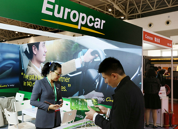 A man looks at brochures about auto touring at a recent outbound tourism fair in Beijing. The fair attracted more than 400 companies engaged in various travel services from 70 countries. (Photo provided to China Daily) A man looks at brochures about auto touring at a recent outbound tourism fair in Beijing. The fair attracted more than 400 companies engaged in various travel services from 70 countries. (Photo provided to China Daily)