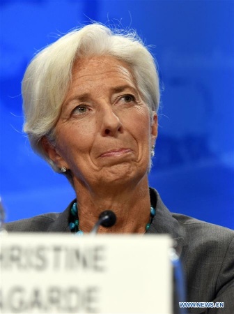 The International Monetary Fund(IMF) Managing Director Christine Lagarde reacts during a press conference in Washington D.C., the United States, on June 22, 2016. (Xinhua file photo/Yin Bogu) The International Monetary Fund(IMF) Managing Director Christine Lagarde reacts during a press conference in Washington D.C., the United States, on June 22, 2016. (Xinhua file photo/Yin Bogu)