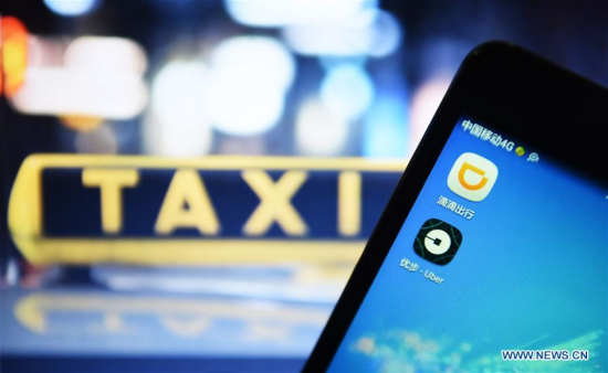 Photo taken on Aug. 1, 2016 shows Apps of Didi and Uber on a cellphone of a citizen in Hangzhou, capital of east China's Zhejiang Province. (Xinhua/Long Wei) Photo taken on Aug. 1, 2016 shows Apps of Didi and Uber on a cellphone of a citizen in Hangzhou, capital of east China's Zhejiang Province. (Xinhua/Long Wei)