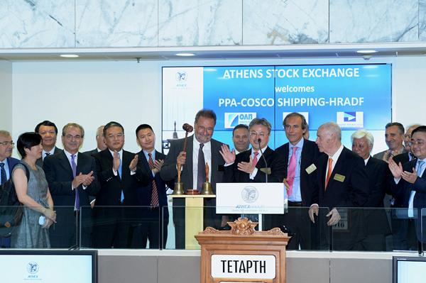 Executives of Chinese shipping behemoth Cosco Shipping Co. Ltd ring the bell for the formal start of trading on the Athens Stock Exchange after signing the agreement that made Cosco the 51 percent owner of Greece's biggest harbor in Athens, Greece, Aug 10 2016. (Photo/Provided to China Daily) Executives of Chinese shipping behemoth Cosco Shipping Co. Ltd ring the bell for the formal start of trading on the Athens Stock Exchange after signing the agreement that made Cosco the 51 percent owner of Greece's biggest harbor in Athens, Greece, Aug 10 2016. (Photo/Provided to China Daily)