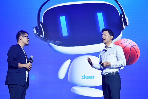 Robin Li (right), chief executive officer of Baidu Inc at the launch ofBaidu Brain on Sept 1, 2016 in Beijing. (Photo/China Daily) Robin Li (right), chief executive officer of Baidu Inc at the launch ofBaidu Brain on Sept 1, 2016 in Beijing. (Photo/China Daily)