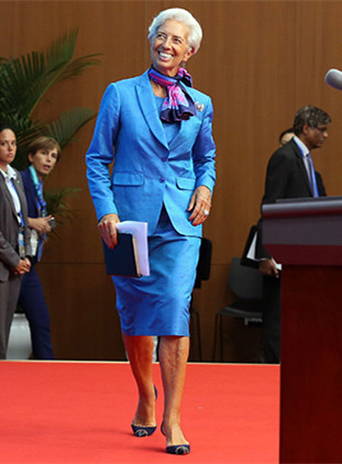 International Monetary Fund Managing Director Christine Lagarde walks to the podium before a news conference at the G20 Summit news center on Monday. (Photo/China Daily) International Monetary Fund Managing Director Christine Lagarde walks to the podium before a news conference at the G20 Summit news center on Monday. (Photo/China Daily)