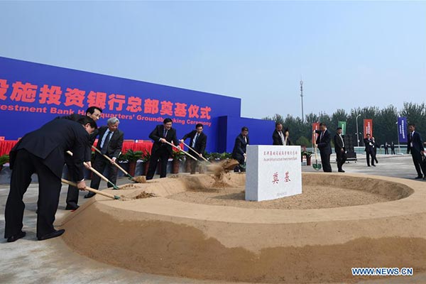Guests attend the groundbreaking ceremony for the permanent headquarters of the Asian Infrastructure Investment Bank (AIIB) in Beijing, capital of China, Sept. 23, 2016. (Photo/Xinhua) Guests attend the groundbreaking ceremony for the permanent headquarters of the Asian Infrastructure Investment Bank (AIIB) in Beijing, capital of China, Sept. 23, 2016. (Photo/Xinhua)
