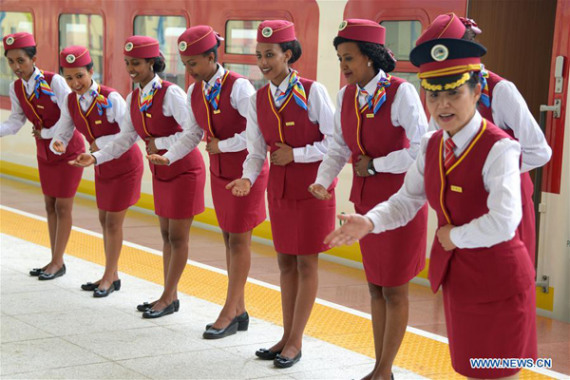 Chinese conductor Ding Jihua (R) trains the Ethiopian attendants at a railway station in suburban Addis Ababa, Ethiopia, Oct 1, 2016.(Photo/Xinhua) Chinese conductor Ding Jihua (R) trains the Ethiopian attendants at a railway station in suburban Addis Ababa, Ethiopia, Oct 1, 2016.(Photo/Xinhua)