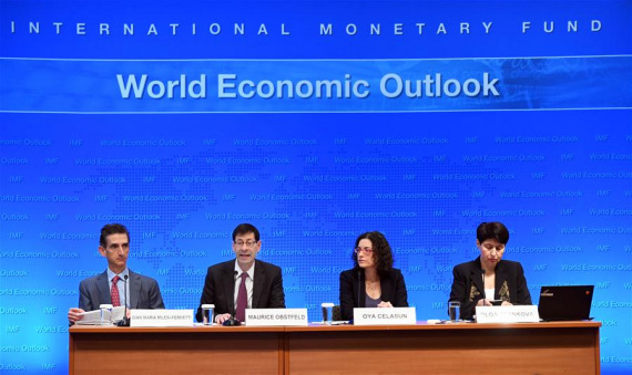 Maurice Obstfeld (2nd L), chief economist at the International Monetary Fund (IMF), attends a press briefing at the IMF headquarters in Washington D.C., the United States, Oct. 4, 2016. The International Monetary Fund (IMF) on Tuesday maintained its forecast for global growth in 2016 at 3.1 percent, saying that subpar growth will continue without determined policy action. (Photo: Xinhua/Yin Bogu) Maurice Obstfeld (2nd L), chief economist at the International Monetary Fund (IMF), attends a press briefing at the IMF headquarters in Washington D.C., the United States, Oct. 4, 2016. The International Monetary Fund (IMF) on Tuesday maintained its forecast for global growth in 2016 at 3.1 percent, saying that subpar growth will continue without determined policy action. (Photo: Xinhua/Yin Bogu)