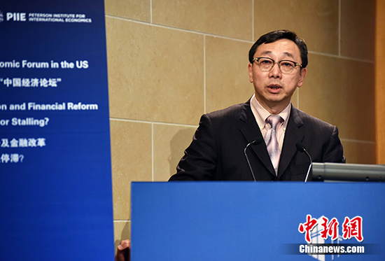International Monetary Fund (IMF) deputy managing director Zhang Tao speaks at the Peterson Institute for International Economics in Washington D.C., Oct 5, 2016. (Photo:China News Service/Zhang Weiran) International Monetary Fund (IMF) deputy managing director Zhang Tao speaks at the Peterson Institute for International Economics in Washington D.C., Oct 5, 2016. (Photo:China News Service/Zhang Weiran)