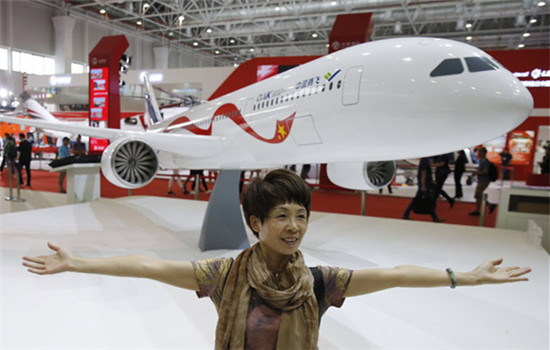 The model of a wide-body commercial jet to be built by China and Russia was unveiled at the Zhuhai air show on Wednesday. It will compete with Boeing and Airbus. (Yin Liqin / For China Daily) The model of a wide-body commercial jet to be built by China and Russia was unveiled at the Zhuhai air show on Wednesday. It will compete with Boeing and Airbus. (Yin Liqin / For China Daily)