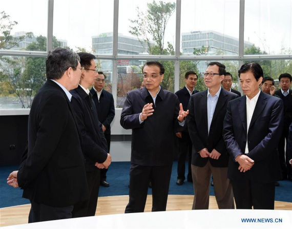 Chinese PremierLi Keqianglistens to work report at Shanghai E&P International Inc in Shanghai, east China, Nov. 22, 2016. Li inspected the Shanghai Pilot Free Trade Zone on Nov. 21 and 22. (Photo: Xinhua/Rao Aimin) Chinese PremierLi Keqianglistens to work report at Shanghai E&P International Inc in Shanghai, east China, Nov. 22, 2016. Li inspected the Shanghai Pilot Free Trade Zone on Nov. 21 and 22. (Photo: Xinhua/Rao Aimin)