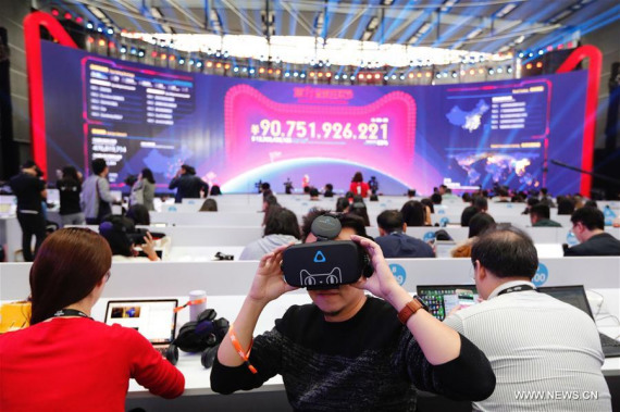 Media workers experience Buy+, the world's first virtual reality (VR) shopping store on Alibaba's online marketplace Tmall, in Shenzhen, south China's Guangdong Province, Nov. 11, 2016. (Photo: Xinhua/Shen Bohan) Media workers experience Buy+, the world's first virtual reality (VR) shopping store on Alibaba's online marketplace Tmall, in Shenzhen, south China's Guangdong Province, Nov. 11, 2016. (Photo: Xinhua/Shen Bohan)