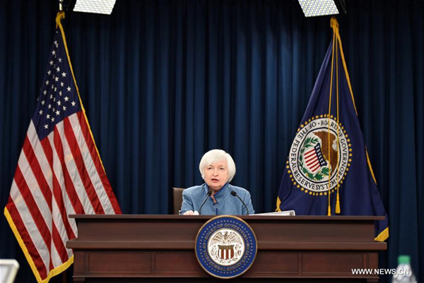 U.S. Federal Reserve Chair Janet Yellen speaks during a news conference in Washington D.C., capital of the United States, Dec. 14, 2016. U.S. Federal Reserve on Wednesday decided to raise benchmark interest rate by 25 basis points, the first and only time in 2016. (Xinhua/Bao Dandan) U.S. Federal Reserve Chair Janet Yellen speaks during a news conference in Washington D.C., capital of the United States, Dec. 14, 2016. U.S. Federal Reserve on Wednesday decided to raise benchmark interest rate by 25 basis points, the first and only time in 2016. (Xinhua/Bao Dandan)