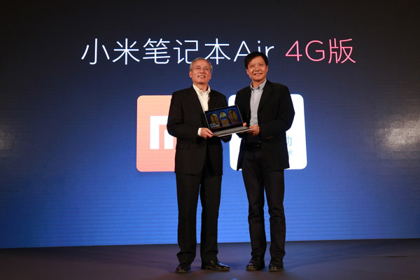 Xiaomi founder Lei Jun and China Mobile's Sha Yuejia pose at the launch ceremony of Mi Air 4G in Beijing, on Dec 23, 2016. (Photo provided to chinadaily.com.cn) Xiaomi founder Lei Jun and China Mobile's Sha Yuejia pose at the launch ceremony of Mi Air 4G in Beijing, on Dec 23, 2016. (Photo provided to chinadaily.com.cn)