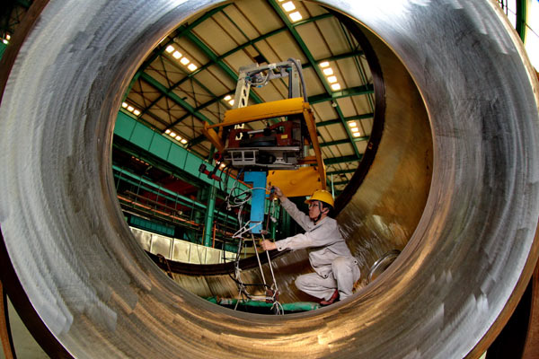 A technician works on a key component of the Hualong One reactor in Qinhuangdao, Hebei province. (Photo/Xinhua) A technician works on a key component of the Hualong One reactor in Qinhuangdao, Hebei province. (Photo/Xinhua)