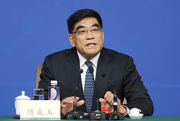 Fu Chengyu, former chairman of Sinopec Group and a member of the Chinese People's Political Consultative Conference (CPPCC) National Committee, at a briefing on Mar 11, 2016. (Photo/China Daily) Fu Chengyu, former chairman of Sinopec Group and a member of the Chinese People's Political Consultative Conference (CPPCC) National Committee, at a briefing on Mar 11, 2016. (Photo/China Daily)