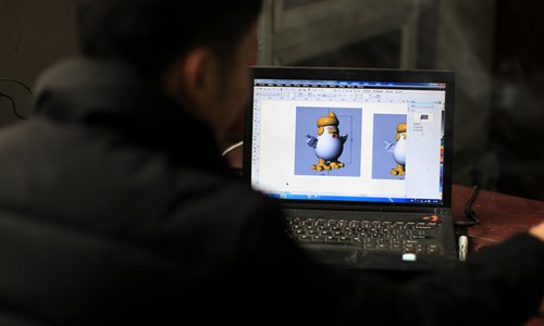 A designer looks at a 3D model of the rooster on a computer. (Photo: Yang Hui/GT) A designer looks at a 3D model of the rooster on a computer. (Photo: Yang Hui/GT)