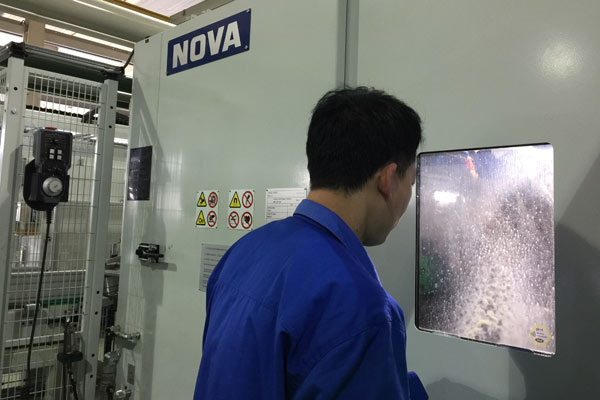 A worker tests a new production line for train bearings in ZWZ Group's factory in Wafangdian, Northeast China's Liaoning Province, Jan. 12, 2017. (Photo/chinadaily.com.cn) A worker tests a new production line for train bearings in ZWZ Group's factory in Wafangdian, Northeast China's Liaoning Province, Jan. 12, 2017. (Photo/chinadaily.com.cn)