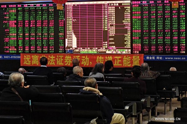 Investors look through stock information at a trading hall in Changchun, capital of northeast China's Jilin Province, Feb. 3, 2017. Chinese stocks closed lower on Friday, with the benchmark Shanghai Composite Index down 0.6 percent at 3,140.17 points. The smaller Shenzhen Component Index closed 0.47 percent lower at 10,004.84 points. The ChiNext Index, which tracks China's NASDAQ-style board of growth enterprises, lost 0.5 percent to close at 1,876.76 points. (Xinhua/Zhang Nan) Investors look through stock information at a trading hall in Changchun, capital of northeast China's Jilin Province, Feb. 3, 2017. Chinese stocks closed lower on Friday, with the benchmark Shanghai Composite Index down 0.6 percent at 3,140.17 points. The smaller Shenzhen Component Index closed 0.47 percent lower at 10,004.84 points. The ChiNext Index, which tracks China's NASDAQ-style board of growth enterprises, lost 0.5 percent to close at 1,876.76 points. (Xinhua/Zhang Nan)