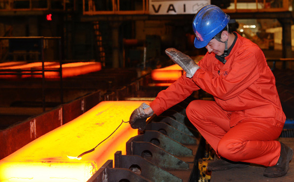 A worker at the factory of Dongbei Special Steel Group Co Ltd in Dalian, Liaoning province. LIU DEBIN / FOR CHINA DAILY A worker at the factory of Dongbei Special Steel Group Co Ltd in Dalian, Liaoning province. LIU DEBIN / FOR CHINA DAILY