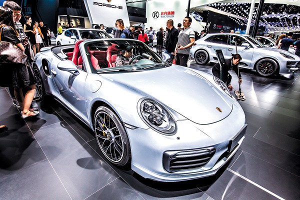 Porsche's 911 Turbo S attracts fans at the Beijing Auto Show in April 2016. (Photo provided to China Daily) Porsche's 911 Turbo S attracts fans at the Beijing Auto Show in April 2016. (Photo provided to China Daily)