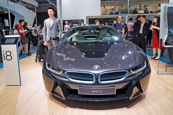 BMW's i8 catches visitors' eyes at the Beijing Auto Show last year. PROVIDED TO CHINA DAILY BMW's i8 catches visitors' eyes at the Beijing Auto Show last year. PROVIDED TO CHINA DAILY