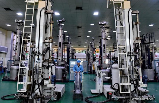 Photo taken on Feb. 24, 2017 shows a worker carrying a monocrystalline silicon stick at a factory in Ningjin County, north China's Hebei Province. (Xinhua/Mu Yu) Photo taken on Feb. 24, 2017 shows a worker carrying a monocrystalline silicon stick at a factory in Ningjin County, north China's Hebei Province. (Xinhua/Mu Yu)