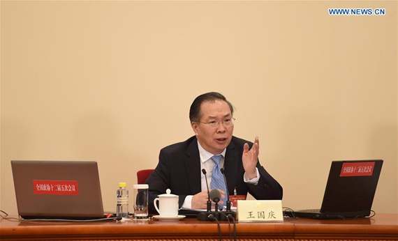 Wang Guoqing, spokesperson for the fifth session of the 12th Chinese People's Political Consultative Conference (CPPCC) National Committee, attends a press conference at the Great Hall of the People in Beijing, capital of China, March 2, 2017. (Xinhua/Xue Yubin) Wang Guoqing, spokesperson for the fifth session of the 12th Chinese People's Political Consultative Conference (CPPCC) National Committee, attends a press conference at the Great Hall of the People in Beijing, capital of China, March 2, 2017. (Xinhua/Xue Yubin)