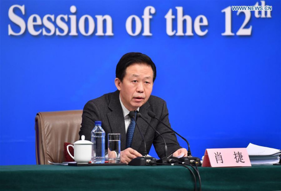 Chinese Minister of Finance Xiao Jie answers questions on reform of fiscal and taxation system and financial work at a press conference for the fifth session of the 12th National People's Congress in Beijing, capital of China, March 7, 2017. (Xinhua/Li Xin) Chinese Minister of Finance Xiao Jie answers questions on reform of fiscal and taxation system and financial work at a press conference for the fifth session of the 12th National People's Congress in Beijing, capital of China, March 7, 2017. (Xinhua/Li Xin)
