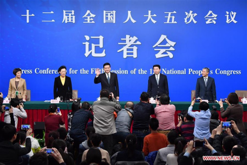 Xiao Yaqing, head of State-owned Assets Supervision and Administration Commission (SASAC), Zhang Xiwu and Huang Danhua, deputy heads of the SASAC, and Peng Huagang, deputy secretary and spokesperson of the SASAC, greet journalists at a press conference on reform of state-owned enterprises for the fifth session of the 12th National People's Congress (NPC) in Beijing, capital of China, March 9, 2017. (Xinhua/Li Xin) Xiao Yaqing, head of State-owned Assets Supervision and Administration Commission (SASAC), Zhang Xiwu and Huang Danhua, deputy heads of the SASAC, and Peng Huagang, deputy secretary and spokesperson of the SASAC, greet journalists at a press conference on reform of state-owned enterprises for the fifth session of the 12th National People's Congress (NPC) in Beijing, capital of China, March 9, 2017. (Xinhua/Li Xin)
