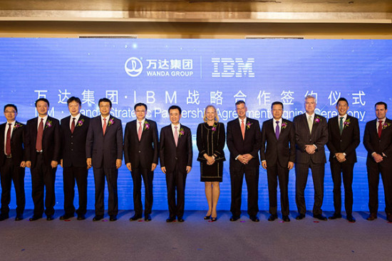 Wanda Group chairman Wang Jianlin and IBM chief executive Ginni Rometty(center) pose for pictures at a partnership agreement signing ceremony in Beijing, March 19, 2017. (Photo provided to chinadaily.com.cn) Wanda Group chairman Wang Jianlin and IBM chief executive Ginni Rometty(center) pose for pictures at a partnership agreement signing ceremony in Beijing, March 19, 2017. (Photo provided to chinadaily.com.cn)
