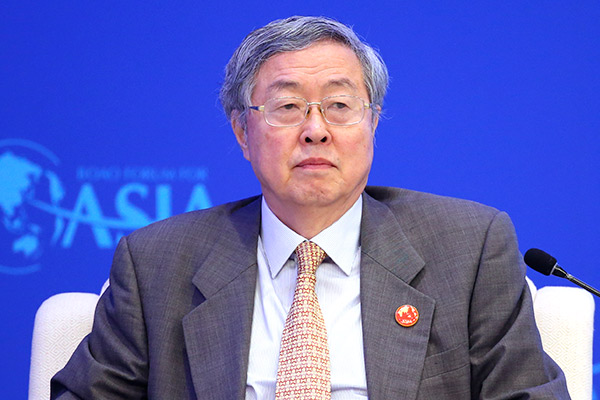 Zhou Xiaochuan, China's central bank governor, speaks at a plenary session of the Boao Forum for Asia in Hainan province, Mar 25, 2017. (Photo/Feng Yongbin) Zhou Xiaochuan, China's central bank governor, speaks at a plenary session of the Boao Forum for Asia in Hainan province, Mar 25, 2017. (Photo/Feng Yongbin)