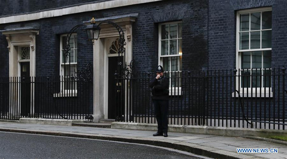 A policeman stands guard at 10 Downing Street in London March 29, 2017. British Prime Minister Theresa May on Tuesday signed the Article 50 letter to officially begin Britain's exit from the European Union, nine months after the country voted to leave the EU in a referendum, local media said. (Xinhua/Han Yan) A policeman stands guard at 10 Downing Street in London March 29, 2017. British Prime Minister Theresa May on Tuesday signed the Article 50 letter to officially begin Britain's exit from the European Union, nine months after the country voted to leave the EU in a referendum, local media said. (Xinhua/Han Yan)