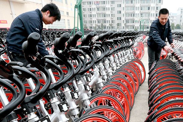 Workers arrange newly manufactured mobikes in Hengyang, Hunan province. (Photo/China Daily) Workers arrange newly manufactured mobikes in Hengyang, Hunan province. (Photo/China Daily)