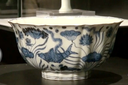A Fish Pond lobed bowl of the Ming Dynasty. (Photo/Screenshot from video of China News Service) A Fish Pond lobed bowl of the Ming Dynasty. (Photo/Screenshot from video of China News Service)