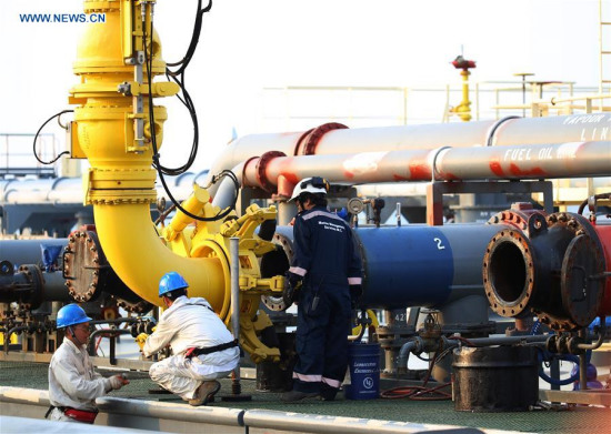 Workers work at Made Island oil port, Myanmar, April 10, 2017. (Xinhua/Zhuang Beining) Workers work at Made Island oil port, Myanmar, April 10, 2017. (Xinhua/Zhuang Beining)