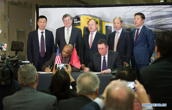 China Railway Rolling Stock Corporation (CRRC)President Xi Guohua (4th R) attends the signing ceremony in Los Angeles, the United States, April 12, 2017. LA Metro on Wednesday signed a 647 million-U.S.-dollar contract to purchase 282 rail cars from CRRC. (Xinhua/Yang Lei) China Railway Rolling Stock Corporation (CRRC)President Xi Guohua (4th R) attends the signing ceremony in Los Angeles, the United States, April 12, 2017. LA Metro on Wednesday signed a 647 million-U.S.-dollar contract to purchase 282 rail cars from CRRC. (Xinhua/Yang Lei)