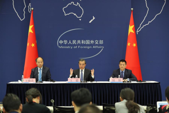 Chinese Foreign Minister Wang Yi (C) and Wang Xiaotao (L), deputy head of the National Development and Reform Commission, attend a press conference on the Belt and Road Forum for International Cooperation in Beijing, capital of China, April 18, 2017. (Xinhua/Xing Guangli) Chinese Foreign Minister Wang Yi (C) and Wang Xiaotao (L), deputy head of the National Development and Reform Commission, attend a press conference on the Belt and Road Forum for International Cooperation in Beijing, capital of China, April 18, 2017. (Xinhua/Xing Guangli)