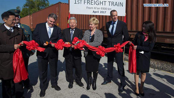 Deputy Secretary of State Tamas Molnar (5th R), who is responsible for customs and international affairs of the Ministry of National Economy and Duan Jielong, Chinese Ambassador to Hungary (4th R) cut a ribbon at the welcoming reception of a China-Europe freight train at Budapest, Hungary, on April 21, 2017. The first freight train from Xi'an, China to Budapest arrived here on Friday. (Xinhua/Attila Volgyi) Deputy Secretary of State Tamas Molnar (5th R), who is responsible for customs and international affairs of the Ministry of National Economy and Duan Jielong, Chinese Ambassador to Hungary (4th R) cut a ribbon at the welcoming reception of a China-Europe freight train at Budapest, Hungary, on April 21, 2017. The first freight train from Xi'an, China to Budapest arrived here on Friday. (Xinhua/Attila Volgyi)