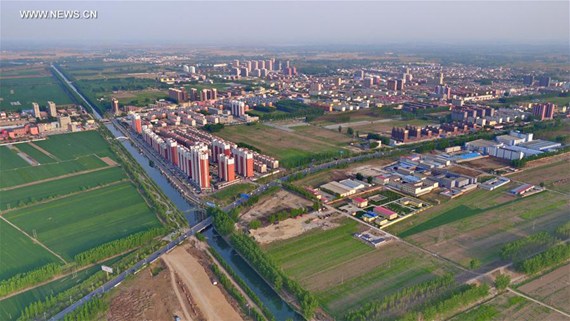 Photo taken on April 21, 2017 shows the scenery of the county seat of Rongcheng, north China's Hebei Province. China announced the plan for Xiongan New Area, an economic zone about 100 kilometers south of Beijing, on April 1, 2017. (Xinhua/Yang Shiyao) Photo taken on April 21, 2017 shows the scenery of the county seat of Rongcheng, north China's Hebei Province. China announced the plan for Xiongan New Area, an economic zone about 100 kilometers south of Beijing, on April 1, 2017. (Xinhua/Yang Shiyao)