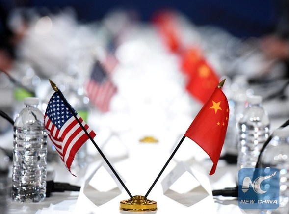 File photo taken on Nov. 23, 2016 shows the national flags of the United States and China during the 27th Session of the China-U.S. Joint Commission on Commerce and Trade (JCCT) in Washington D.C., capital of the United States. (Xinhua/Yin Bogu) File photo taken on Nov. 23, 2016 shows the national flags of the United States and China during the 27th Session of the China-U.S. Joint Commission on Commerce and Trade (JCCT) in Washington D.C., capital of the United States. (Xinhua/Yin Bogu)