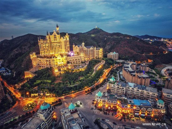 Aerial photo taken on June 11, 2017 shows a castle hotel in Dalian, northeast China's Liaoning Province. Dalian is one of the host cities of the Summer Davos meeting. (Xinhua/Pan Yulong) Aerial photo taken on June 11, 2017 shows a castle hotel in Dalian, northeast China's Liaoning Province. Dalian is one of the host cities of the Summer Davos meeting. (Xinhua/Pan Yulong)