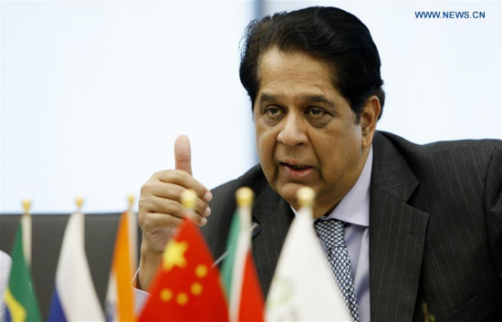 President of the BRICS New Development Bank K.V. Kamath answers questions during a press conference in Shanghai, east China, July 6, 2017. (Xinhua/Fang Zhe) President of the BRICS New Development Bank K.V. Kamath answers questions during a press conference in Shanghai, east China, July 6, 2017. (Xinhua/Fang Zhe)