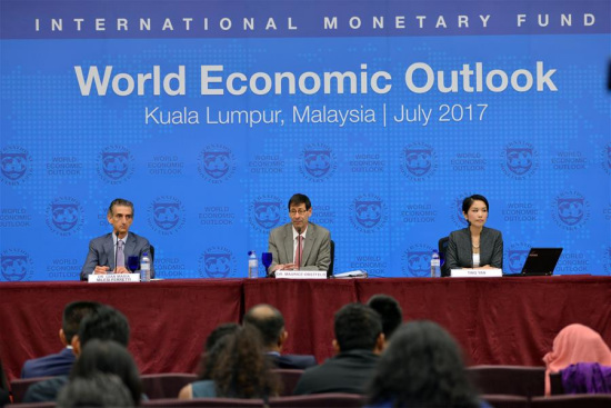 Maurice Obstfeld (C), chief economist of the International Monetary Fund (IMF) addresses to the media in Kuala Lumpur, Malaysia, July 24, 2017. (Xinhua/Chong Voon Chung) Maurice Obstfeld (C), chief economist of the International Monetary Fund (IMF) addresses to the media in Kuala Lumpur, Malaysia, July 24, 2017. (Xinhua/Chong Voon Chung)