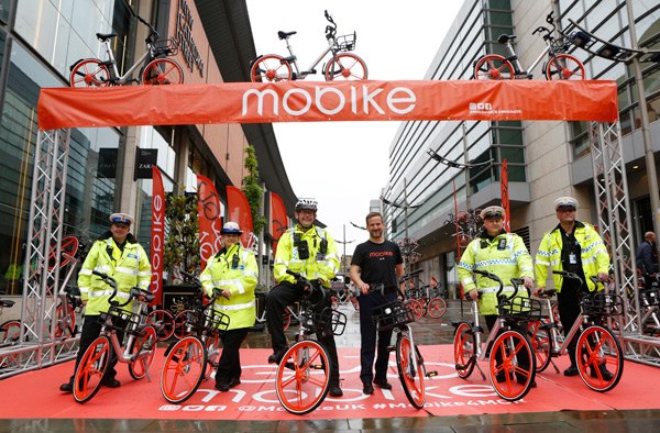 Manchester traffic police pose with Mobike bicycles at the launch of the bike-sharing services on June 29. Manchester marks the beginning of the Chinese company's global expansion, which popularizes the concept of sharing economy. XINHUA Manchester traffic police pose with Mobike bicycles at the launch of the bike-sharing services on June 29. Manchester marks the beginning of the Chinese company's global expansion, which popularizes the concept of sharing economy. XINHUA