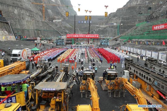 A ceremony is held at the construction site of Baihetan project, which is located downstream of the Jinsha River, the upper section of the Yangtze, in Ningnan county of southwest China's Sichuan Province and Qiaojia county of neighboring Yunnan Province, on Aug. 3, 2017. (Xinhua/Sun Ronggang) A ceremony is held at the construction site of Baihetan project, which is located downstream of the Jinsha River, the upper section of the Yangtze, in Ningnan county of southwest China's Sichuan Province and Qiaojia county of neighboring Yunnan Province, on Aug. 3, 2017. (Xinhua/Sun Ronggang)
