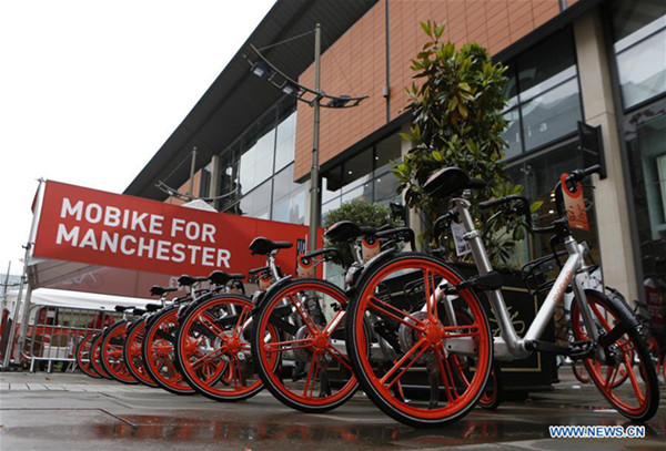 A row of Mobikes are seen in Manchester, Britain on June 29, 2017. Mobike, one of China's largest bike-sharing companies, launched its service in the Greater Manchester, Britain, on Thursday. (Xinhua/Craig Brough) A row of Mobikes are seen in Manchester, Britain on June 29, 2017. Mobike, one of China's largest bike-sharing companies, launched its service in the Greater Manchester, Britain, on Thursday. (Xinhua/Craig Brough)
