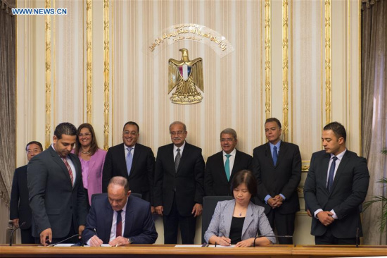 Egyptian Prime Minister Sherif Ismail (4th R, Rear) attends the signing ceremony between Egypt's National Authority for Tunnels (NAT) and the joint coalition of China's AVIC International and China Railway Group Limited in Cairo, Egypt, on Aug. 15, 2017. (Xinhua/Meng Tao) Egyptian Prime Minister Sherif Ismail (4th R, Rear) attends the signing ceremony between Egypt's National Authority for Tunnels (NAT) and the joint coalition of China's AVIC International and China Railway Group Limited in Cairo, Egypt, on Aug. 15, 2017. (Xinhua/Meng Tao)