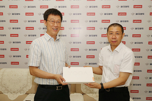 He Zhiqiang, president of Lenovo Capital and Incubator Group, and Sun Zhongchun, general manager of Haima Car Co Ltd, at a news conference in Zhengzhou, Henan province, Aug 16, 2017. He Zhiqiang, president of Lenovo Capital and Incubator Group, and Sun Zhongchun, general manager of Haima Car Co Ltd, at a news conference in Zhengzhou, Henan province, Aug 16, 2017.
