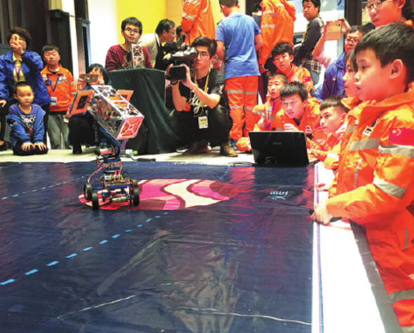 Children find out what makes a satellite tick at space startup Commsat Technology Development Co Ltd in Beijing. (Photo provided to China Daily) Children find out what makes a satellite tick at space startup Commsat Technology Development Co Ltd in Beijing. (Photo provided to China Daily)