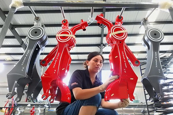 A technician tests a bicycle frame at a bike-manufacturing company in Lianyungang, Jiangsu province. (Geng Yue/for China Daily) A technician tests a bicycle frame at a bike-manufacturing company in Lianyungang, Jiangsu province. (Geng Yue/for China Daily)